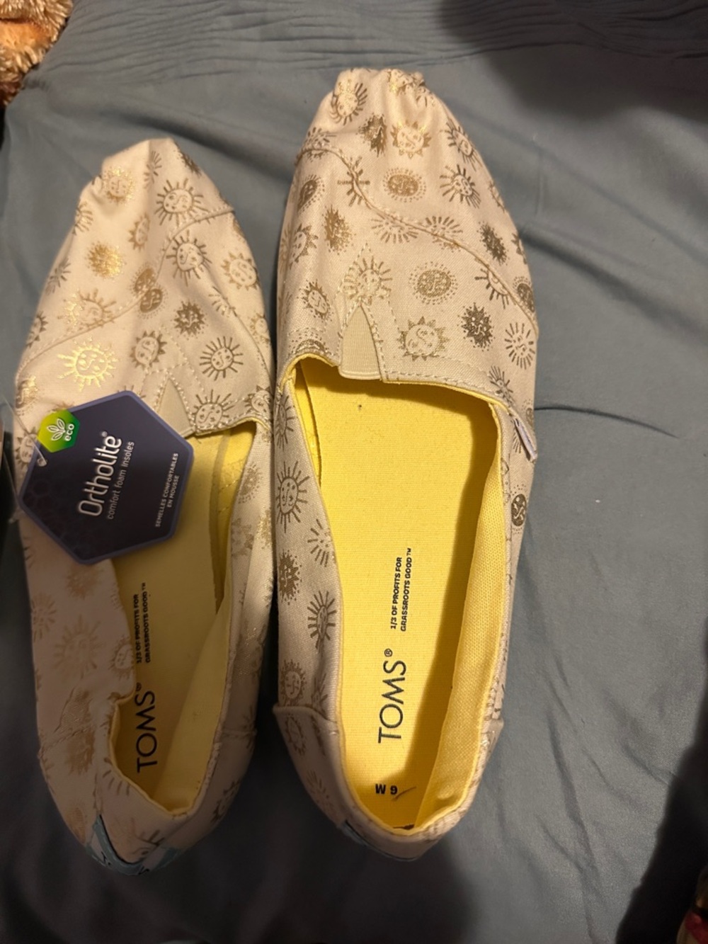 Toms Cream Slip-On Canvas Shoes with Gold Sun Print - Picture 2 of 2